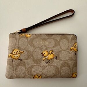 Coach Beige Wristlet with Yellow Chick Design